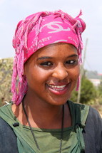 woman wearing a traditional head scarf 