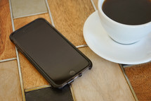 cellphone and coffee cup 