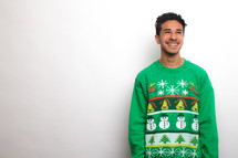 man in an ugly Christmas sweater 
