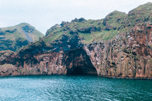 sea cave on sea cliffs along a coastline 