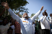 Haitian man praising God