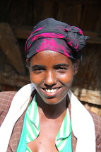 Ethiopian woman wearing a traditional head scarf 