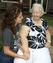 grandmother and granddaughter holding hands 