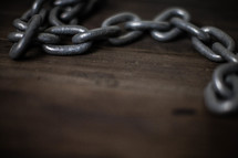 chain links on wood 