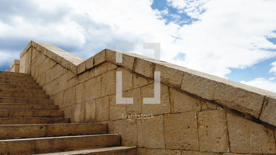 Stairs to the overlooking of Siracusa city with cloudy sky