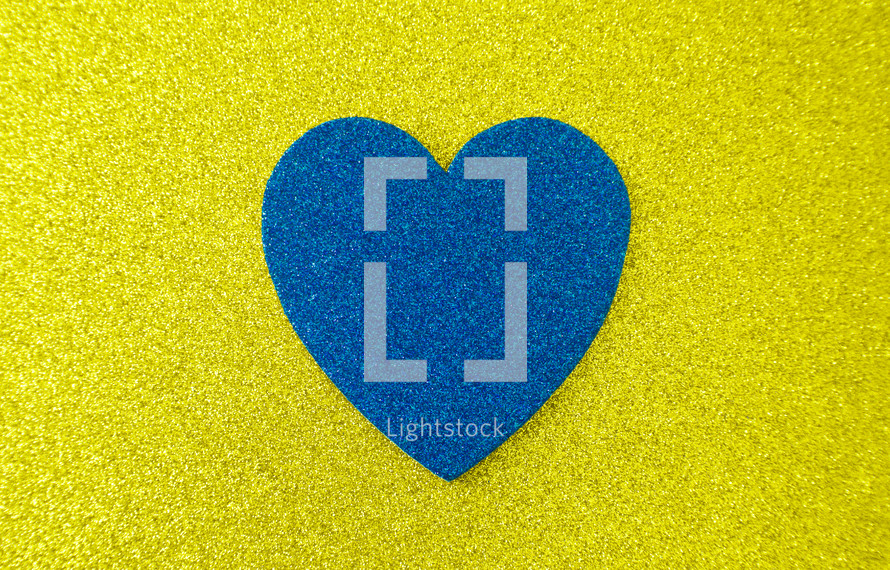 blue heart on yellow 