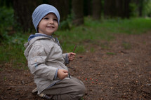 portrait of a toddler boy outdoors 