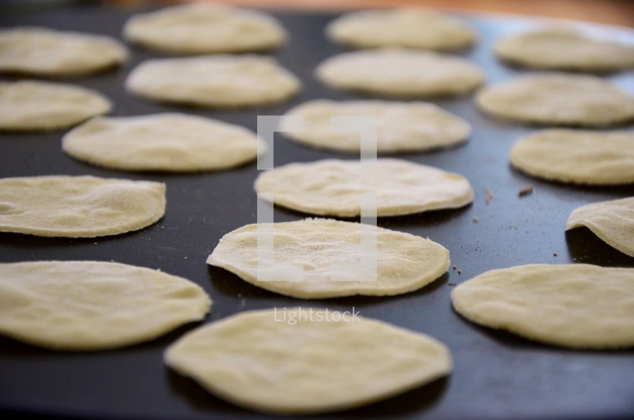 Matzah or (unleavened bread) cooking on a hot plate.