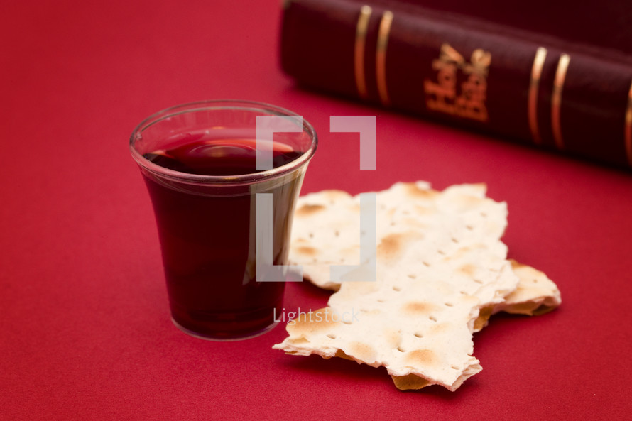 Bible, communion bread and wine cup 