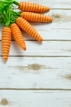 Carrot decorations on wood 