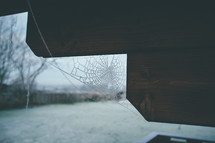 spiderweb on a porch 