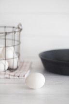 eggs in a wire basket 