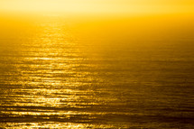 golden sunlight over the ocean 