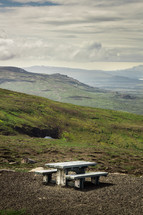 picnic table on a mountaintop 