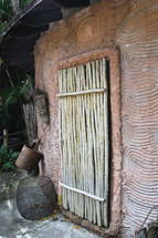 bamboo door on a mud hut 