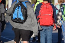 boys walking home after school 