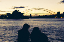 women looking at Sydney Harbour Bridge