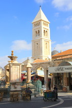 bell tower in a town square 