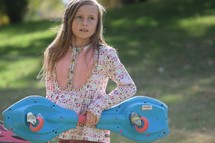 a girl carrying a ripstick