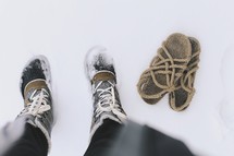 boots and sandals in snow 
