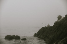 fishing on a rocky shore 