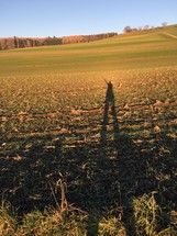 shadow cast on farmland 