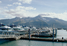 Ships lined up at harbor in Seward, Alaska