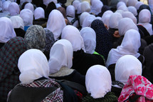 Backs of the heads of Muslim woman in scarves 