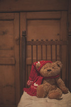 a teddy bear on a chair 