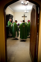 priests and bishops in prayer 
