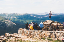 People on a mountain overlook.