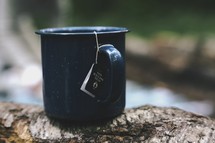 tea bag in a mug while camping 