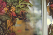 fall wreath on a front door 