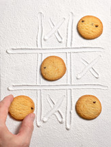 Abstract Tic Tac Toe Game With Sugar and  Holiday Butter Cookies