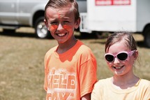brother and sister outdoors at field day 