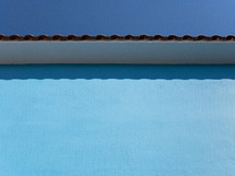 tile roof on a blue house 