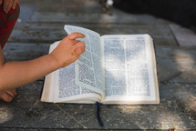 boy reading a Bible 