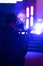 videographer recording a worship service 