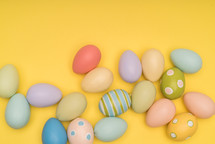 yellow background with Easter eggs