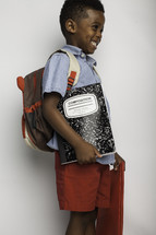 a boy child ready for school 
