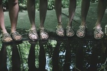 sandals near a puddle 