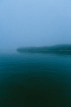 fog over a lake in winter 