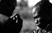 Men in fervent prayer