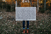 portrait of a woman holding up a Bible verse John 15:1-9