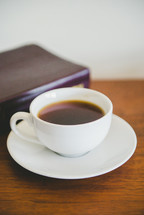 coffee cup and Bible 