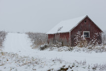 snow on a barn 