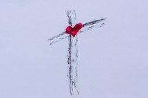 Cross drawn with Ashes with red watercolor heart in center for Ash Wednesday 