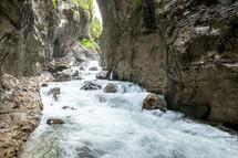 rapids in a river through a canyon 