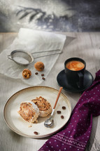 Coffee and treat with purple napkin