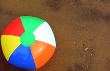 beach ball on sand 